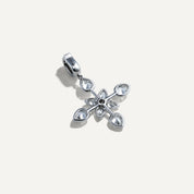 Silver floral pendant with clear gemstones on a light gray background
