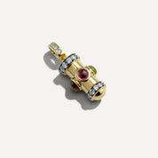 Gold pendant with gemstones and diamonds on a white background